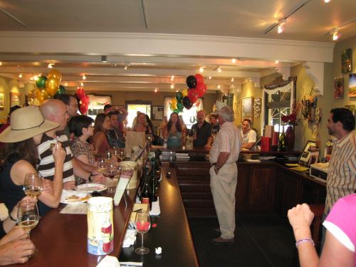 An interior shot of guests enjoying the 5th anniversary party at the Lucas & Lewellen Tasting Room in downtown Solvang
