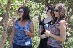 A photo of Wine Club members on a tour of Lucas & Lewellen vineyards