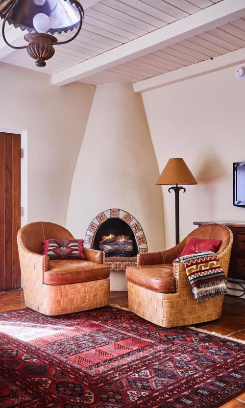 fireplace guest room at Rancho de los Caballeros fireplace guest room at Rancho de los Caballeros