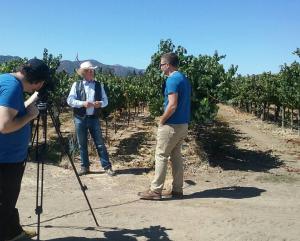 Louis Lucas giving an interview in the vineyard