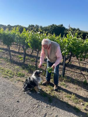 Louis Lucas with his dog Novi at Valley View Vineyard